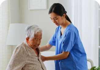 caregiver holding the senior woman