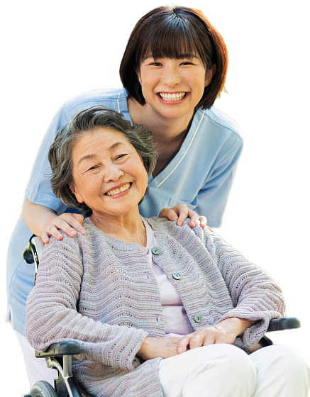 caregiver and senior woman on a wheelchair smiling